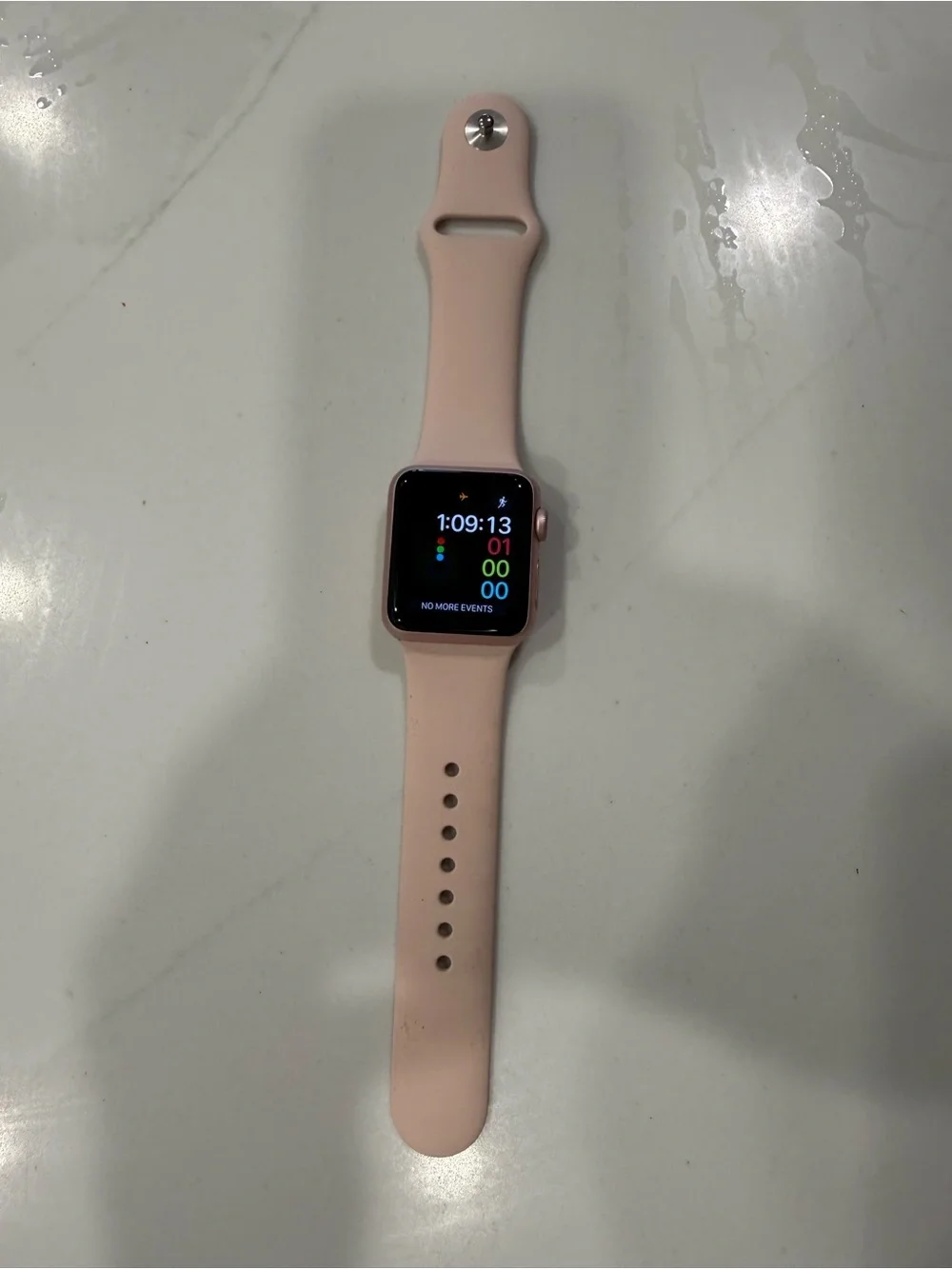 Apple Smartwatch, series 1 38mm with Pale Pink Silicone Band